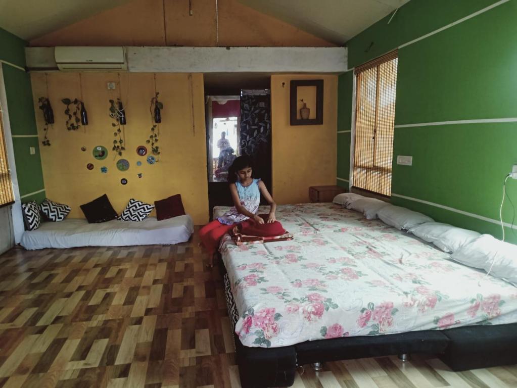 Postel nebo postele na pokoji v ubytování Niyanest Holidayhome