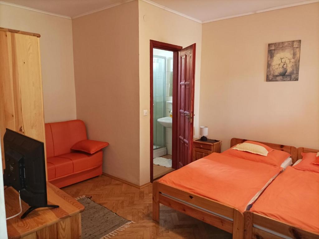 Postel nebo postele na pokoji v ubytování Napfénydomb Vendégház