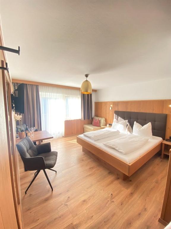 Postel nebo postele na pokoji v ubytování Hotel Andreas