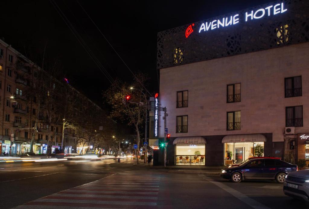 aania hotel on a city street at night at Avenue Hotel Tbilisi in Tbilisi City
