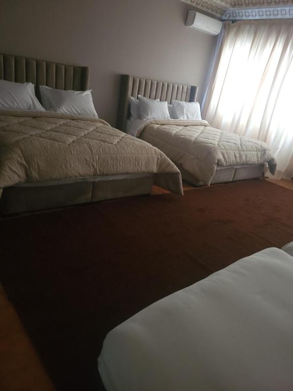 Postel nebo postele na pokoji v ubytování VILLA ADAM TANGIER