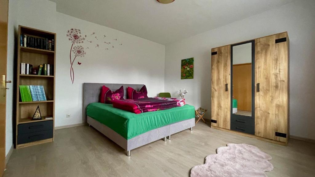 Postel nebo postele na pokoji v ubytování Ferienhaus "Am Flachsee"