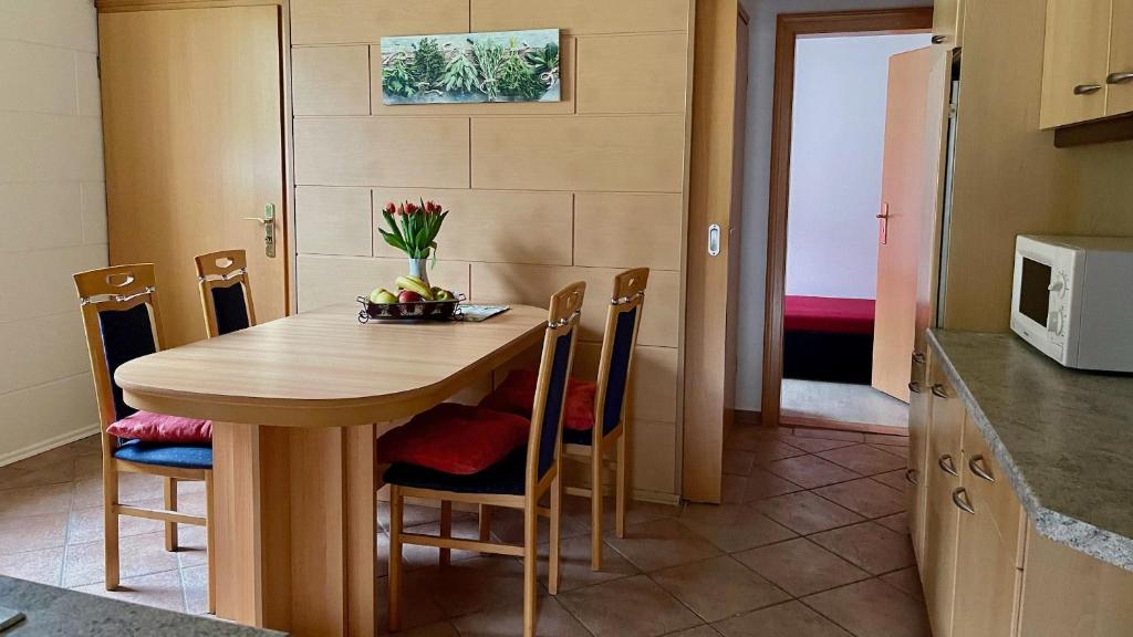 Kuchyň nebo kuchyňský kout v ubytování Ferienhaus "Am Flachsee"
