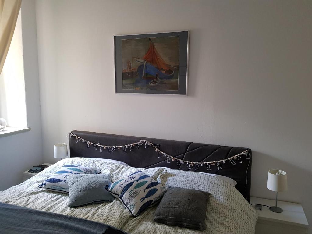 Un ou plusieurs lits dans un hébergement de l'établissement Maison 2 chambres Olsavinia