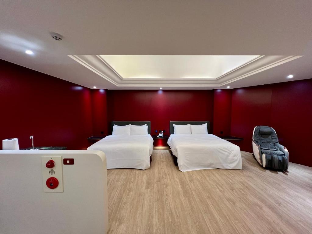 Postel nebo postele na pokoji v ubytování Holiday Motel