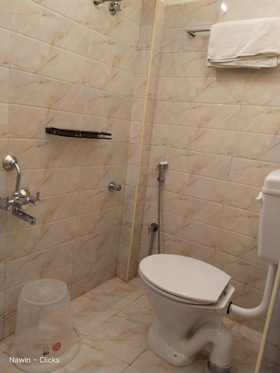 Koupelna v ubytování RedFox Hotel-T.Nagar