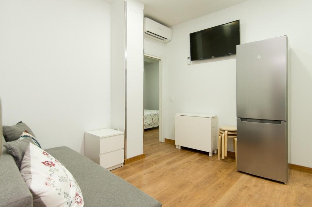 TV a/nebo společenská místnost v ubytování Apartments Center Madrid