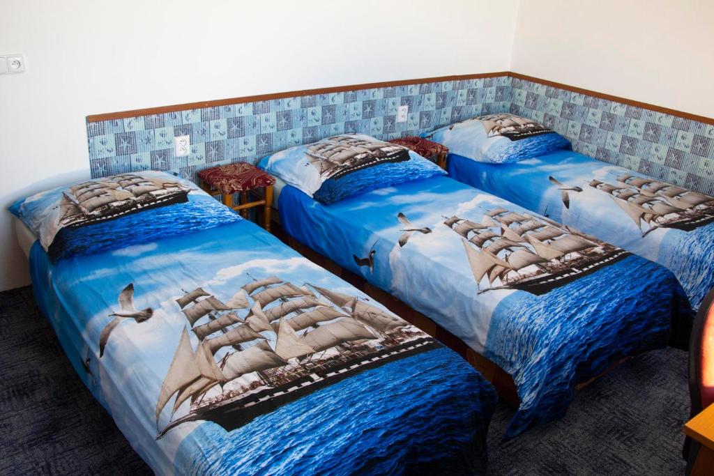Postel nebo postele na pokoji v ubytování Vila Imagina