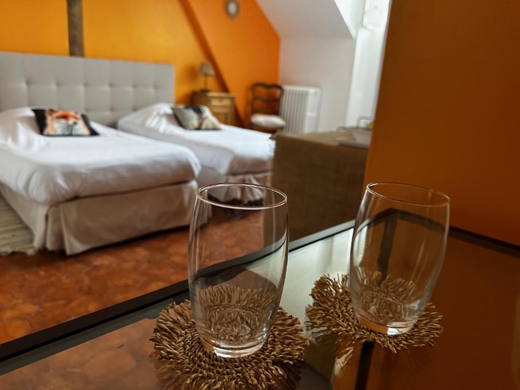 Postel nebo postele na pokoji v ubytování Hôtel les Grands Chênes