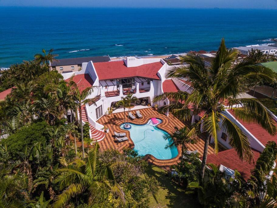 an aerial view of a house with a swimming pool at Lalaria Ocean Villa in Ballito