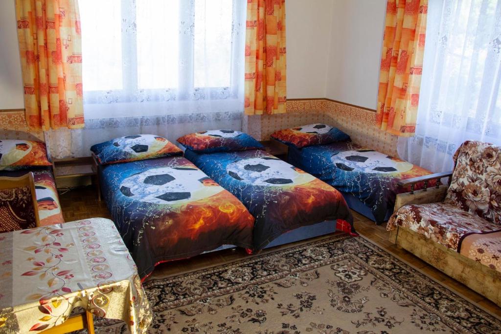 Postel nebo postele na pokoji v ubytování Vila Imagina