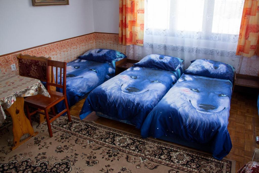 Postel nebo postele na pokoji v ubytování Vila Imagina