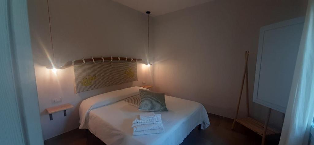 Postel nebo postele na pokoji v ubytování Lispusada Agriturismo Adults Only