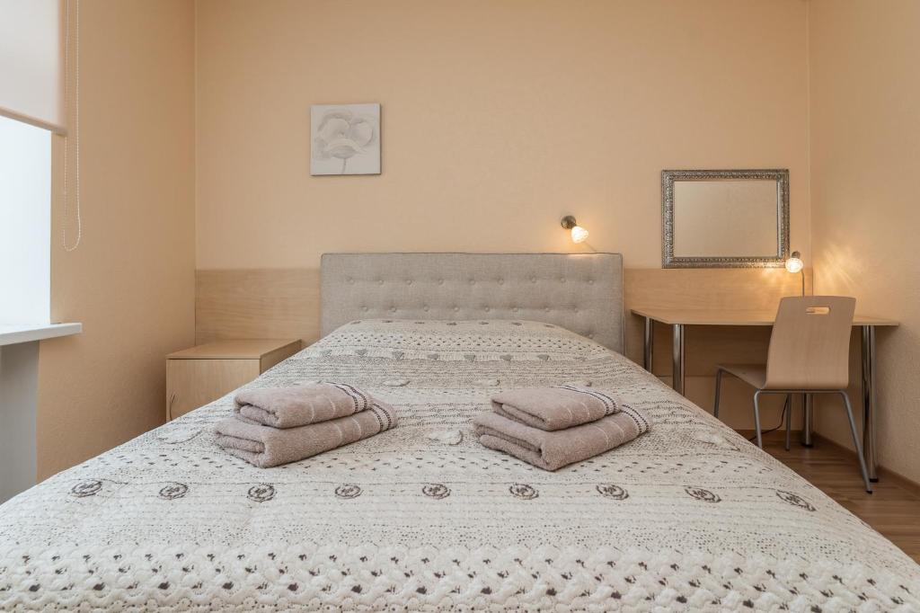 Postel nebo postele na pokoji v ubytování Virumaa Hostel