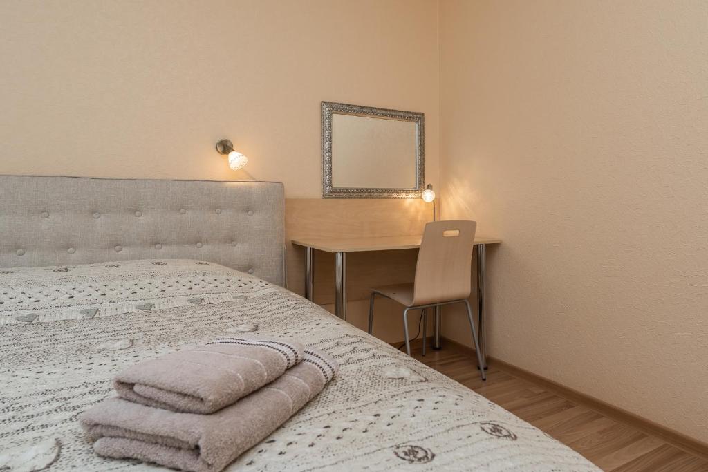 Postel nebo postele na pokoji v ubytování Virumaa Hostel