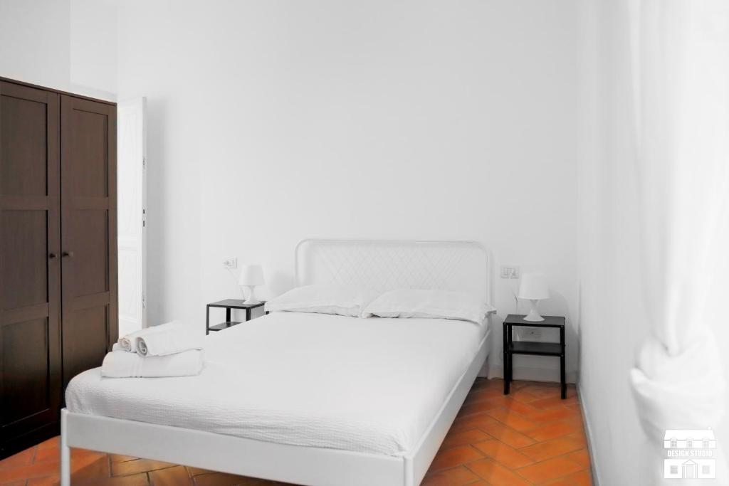 Posteľ alebo postele v izbe v ubytovaní TORRETTA 4 by Design Studio