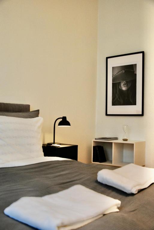 Postel nebo postele na pokoji v ubytování Aparthotel Mageløs 12