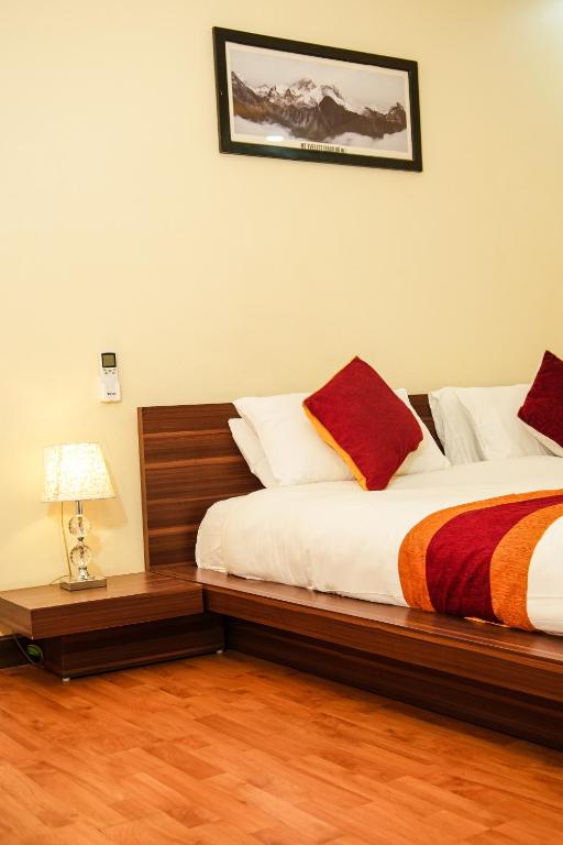 Postel nebo postele na pokoji v ubytování Hotel Edingo Inn