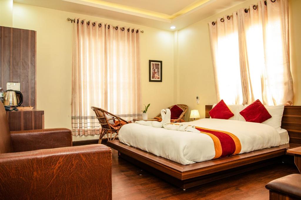 Postel nebo postele na pokoji v ubytování Hotel Edingo Inn