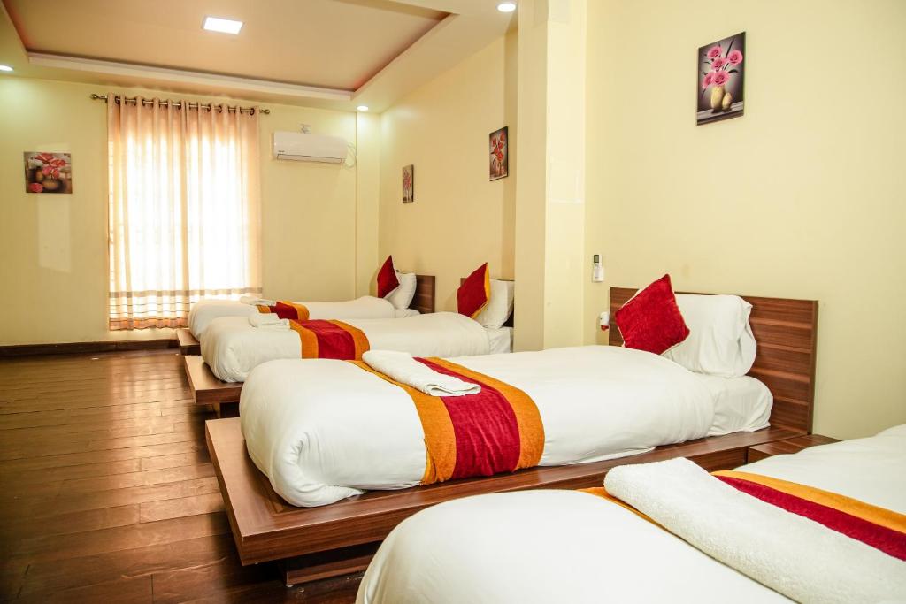 Postel nebo postele na pokoji v ubytování Hotel Edingo Inn