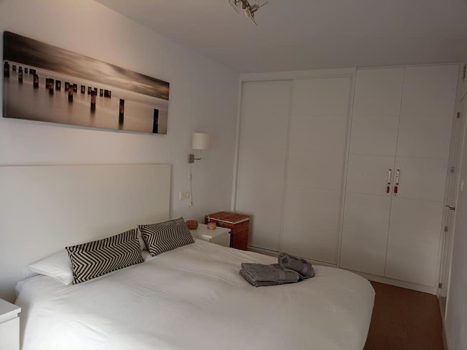 Postel nebo postele na pokoji v ubytování HH Apartamento La Herradura Playa