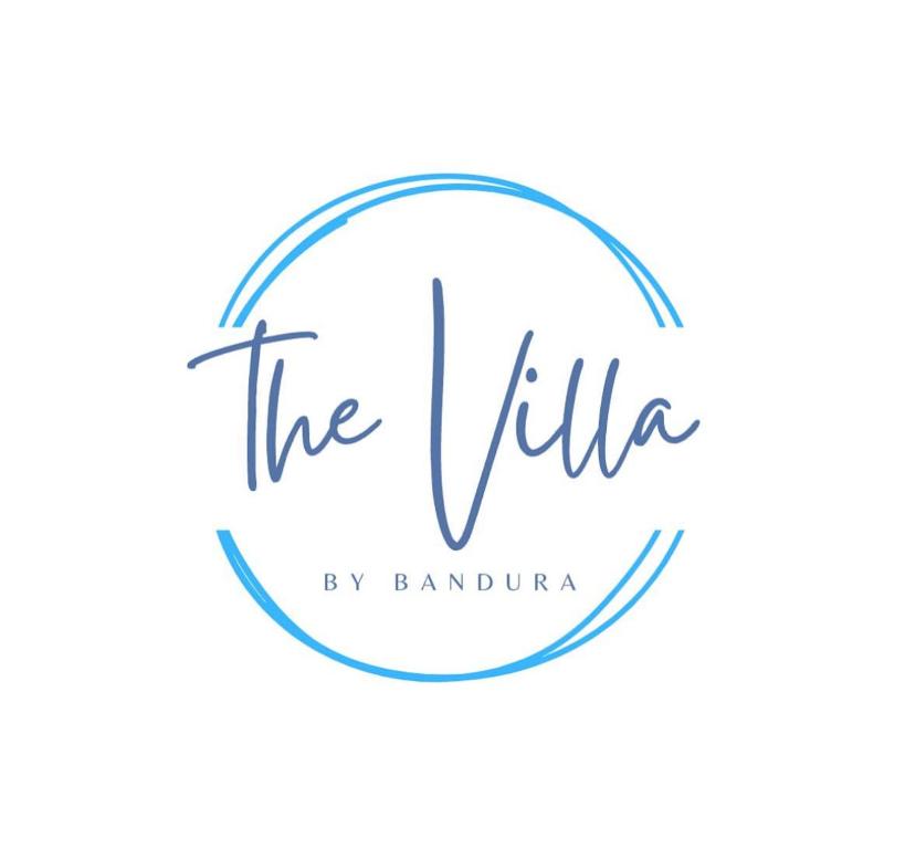 a logo for the village by bangalore at The Villa By Bandura in Dar es Salaam