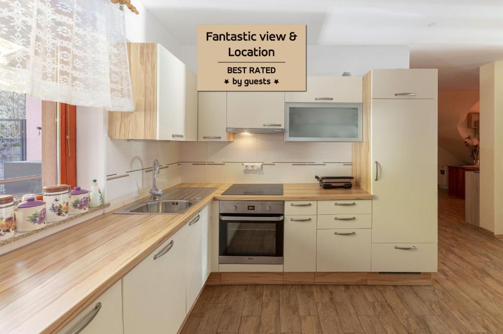 Kuchyň nebo kuchyňský kout v ubytování Apartment Pr' Kavač