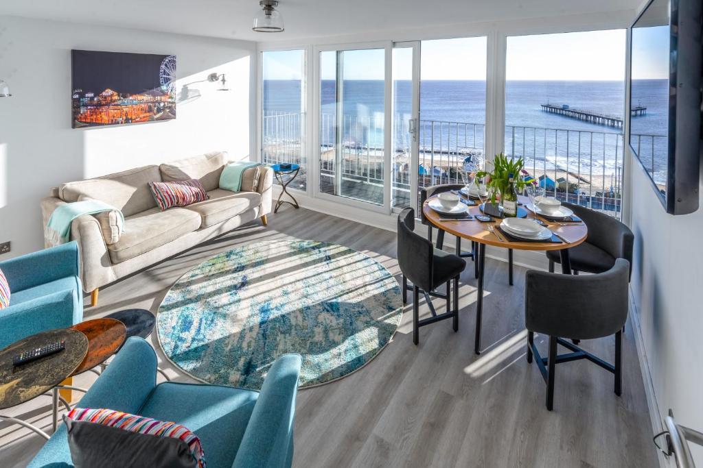 a living room with a view of the ocean at 19 Undercliffe in Felixstowe