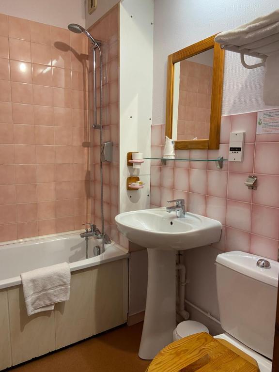 Koupelna v ubytování Hôtel Mélodie