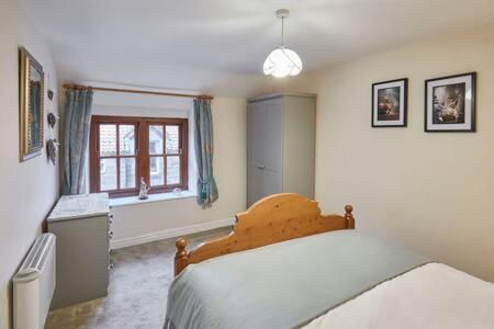 Postel nebo postele na pokoji v ubytování Host & Stay - Lavender Cottage