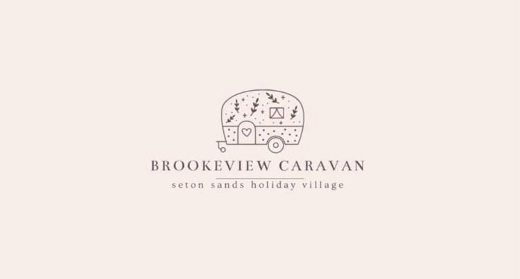 a logo for a food truck with a bus at BrookeView Caravan Rental, Seton Sands in Port Seton