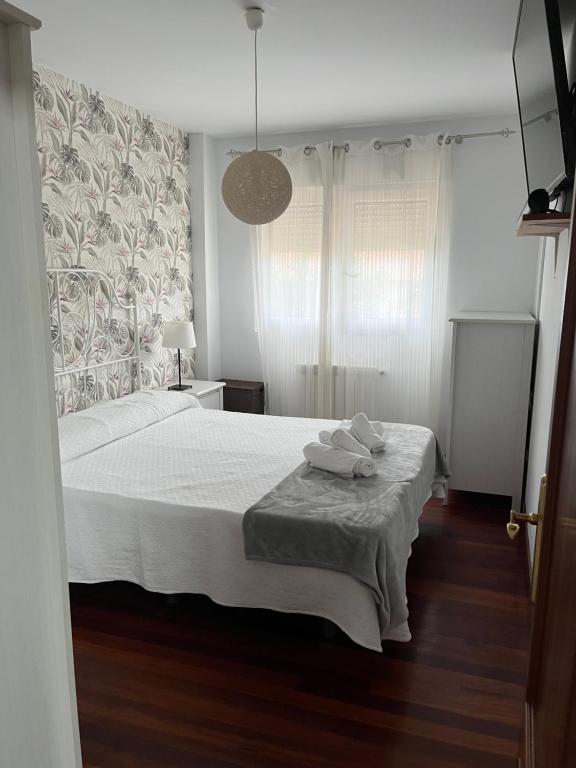 Postel nebo postele na pokoji v ubytování LOS ÁLAMOS
