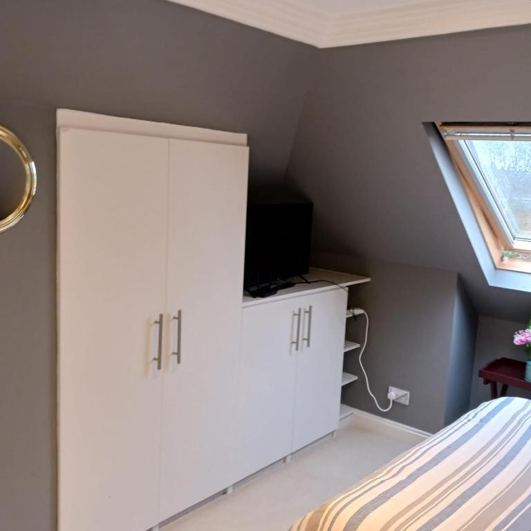Postel nebo postele na pokoji v ubytování 26 Green Drive Inverness