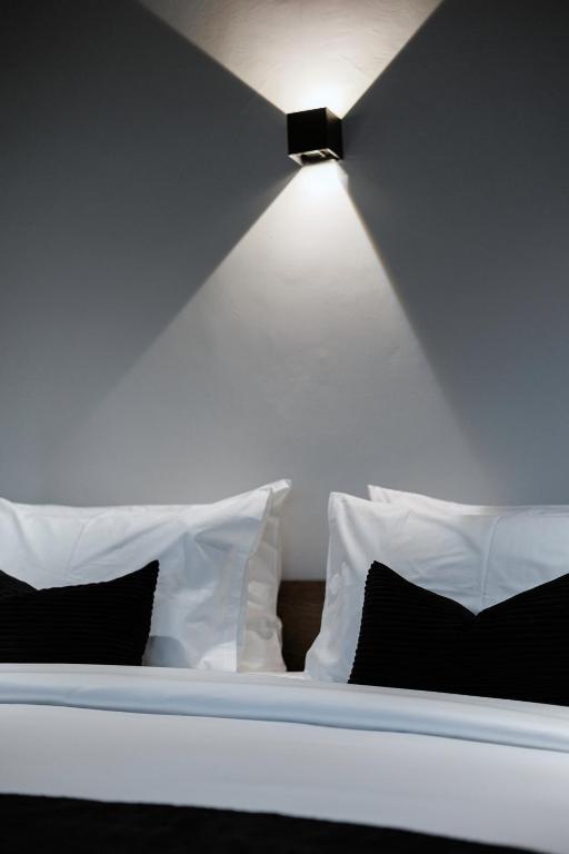 Postel nebo postele na pokoji v ubytování BedTime Hotel Samui