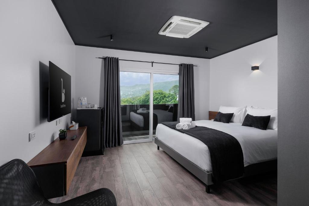 Postel nebo postele na pokoji v ubytování BedTime Hotel Samui