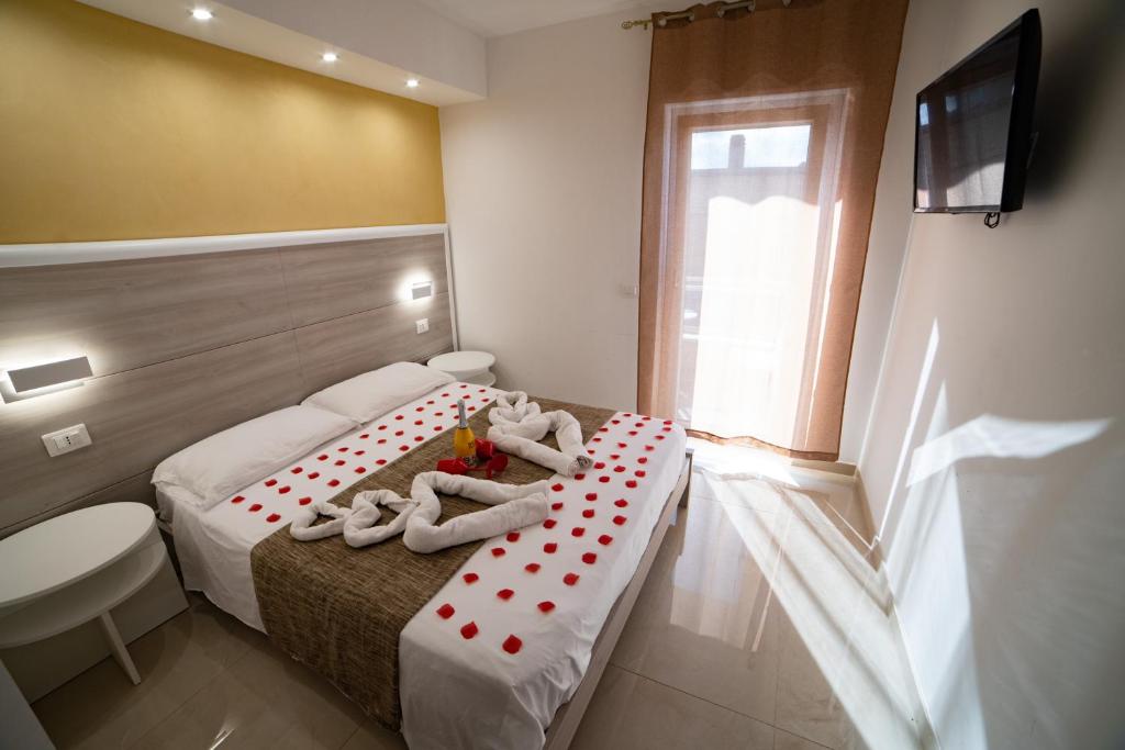 Postel nebo postele na pokoji v ubytování B&B Jerocades