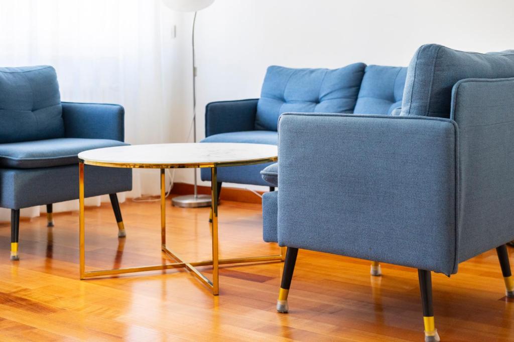 A seating area at Sprone Apartment