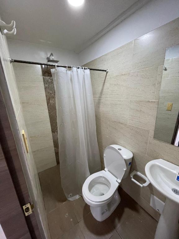 Koupelna v ubytování Hotel Maratea Melgar