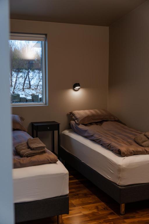 Postel nebo postele na pokoji v ubytování Golden Circle Villa - Hot Tub & Sauna