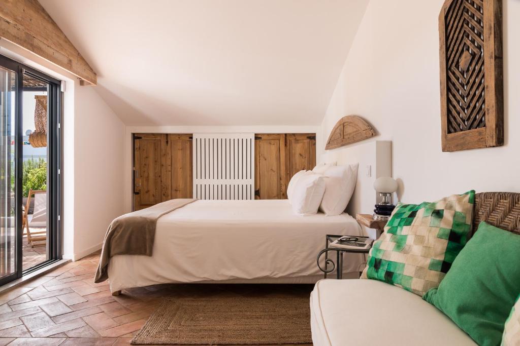 Postel nebo postele na pokoji v ubytování Altanure Almatere - Food Forest Boutique Stay