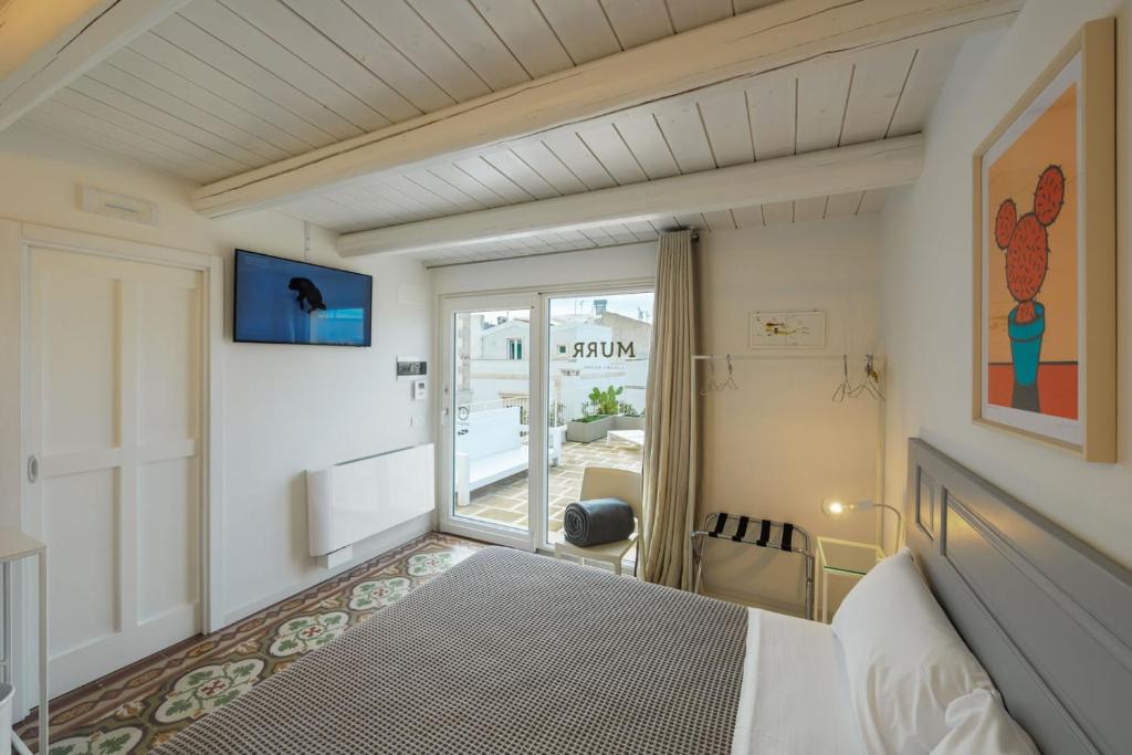 Postel nebo postele na pokoji v ubytování Murr Luxury Rooms