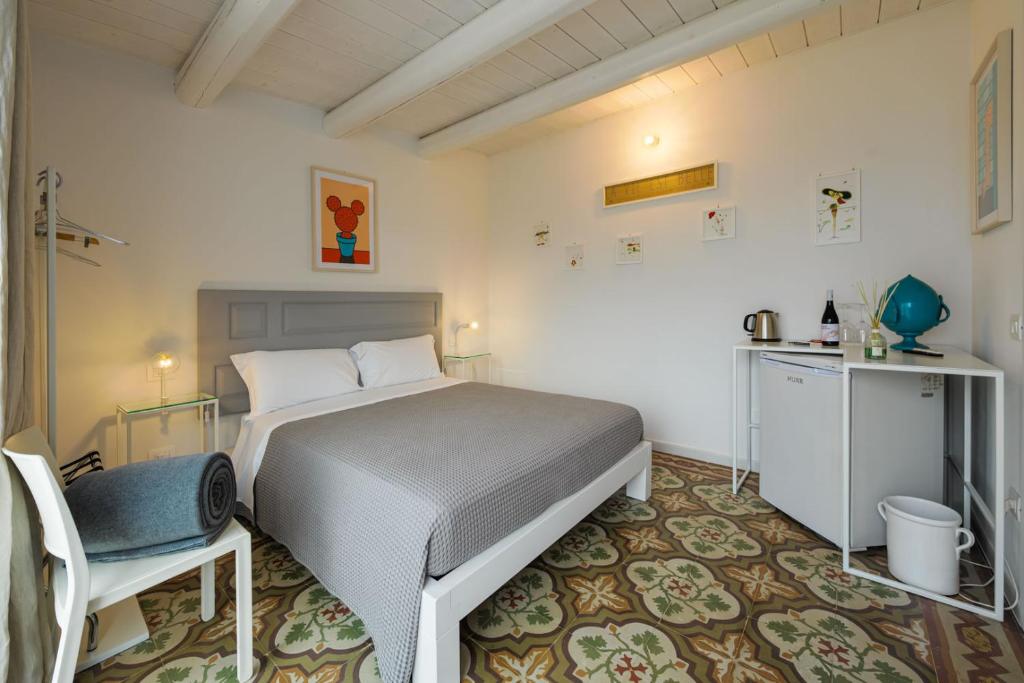Postel nebo postele na pokoji v ubytování Murr Luxury Rooms