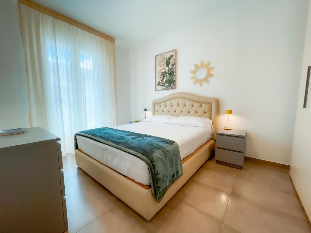 Postel nebo postele na pokoji v ubytování Casa Sorelle Maricò