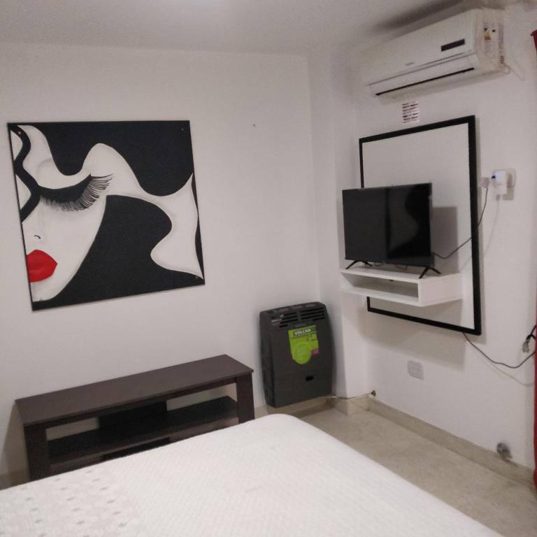 TV a/nebo společenská místnost v ubytování Rosa Ramona Rooms