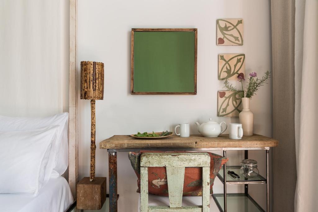 Postel nebo postele na pokoji v ubytování Altanure Almatere - Food Forest Boutique Stay