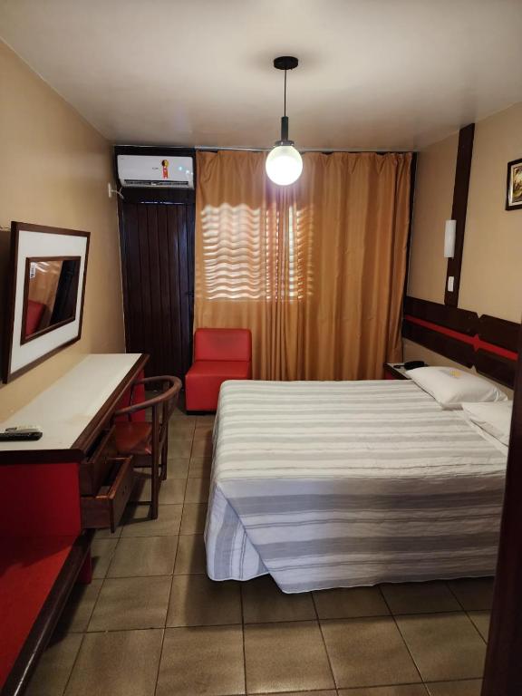Postel nebo postele na pokoji v ubytování Baia Cabralia Hotel