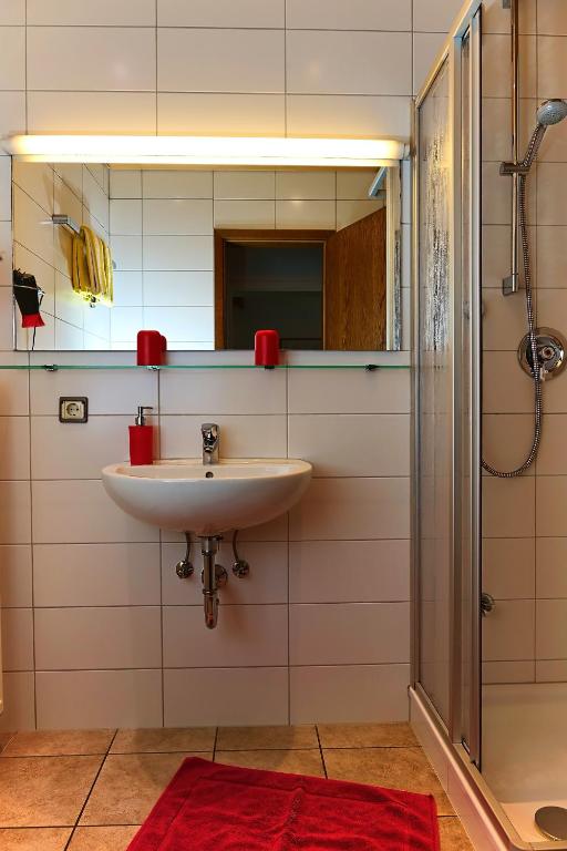 Koupelna v ubytování Hotel Garni Sebastian