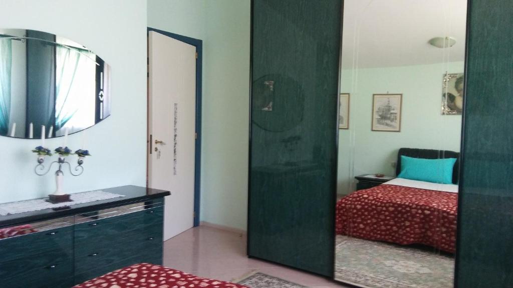 Postel nebo postele na pokoji v ubytování B&B Villa Lena