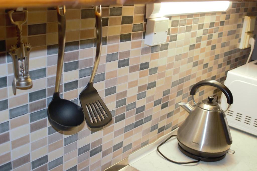 Kuchyň nebo kuchyňský kout v ubytování Apartmán Šurany