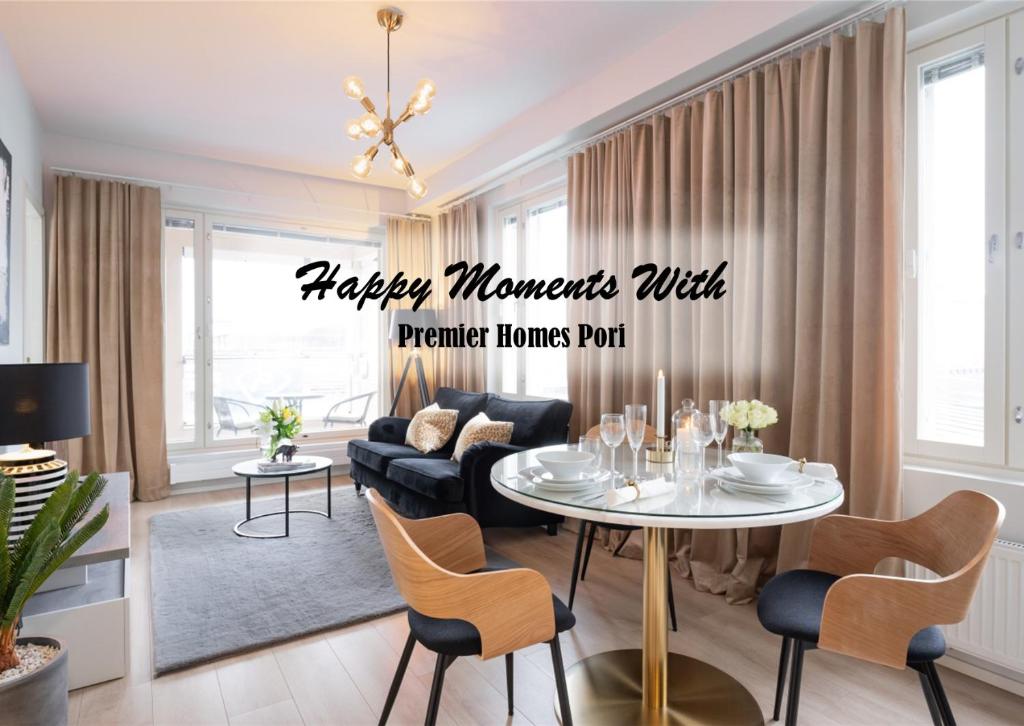 a living room with a happy moments rule premier house pad at Premier Homes Pori Center Jazz in Pori
